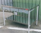 Banco da lavoro Tipo C/G 92 a due piani in acciaio inox, completo di tre cassetti Banco da lavoro Tipo C/G 92 a due piani in acciaio inox, completo di tre cassetti